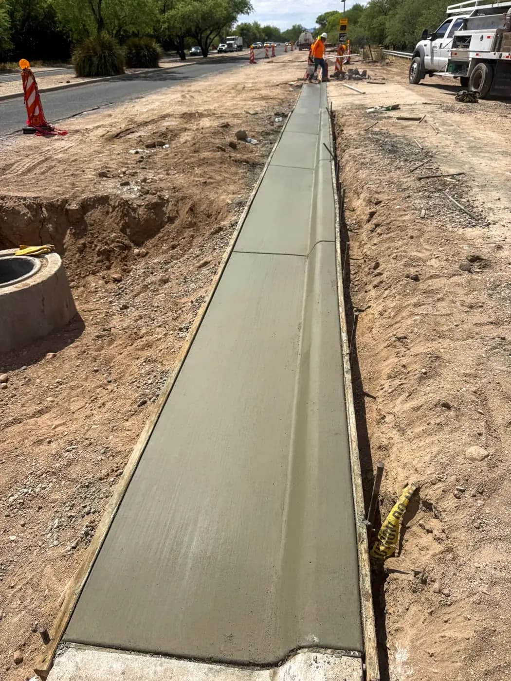 Concrete curb and mow strip formed along a Tucson street