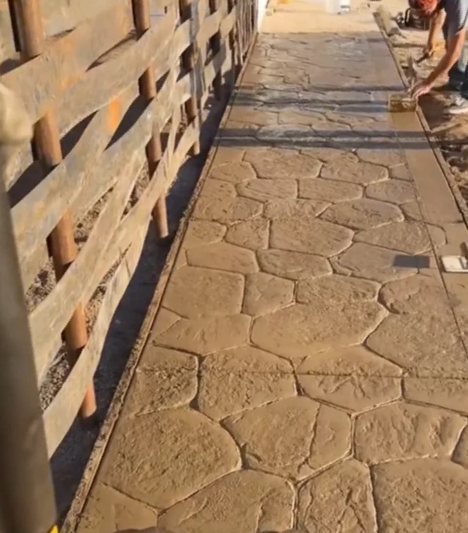 Stamped flagstone-pattern concrete walkway