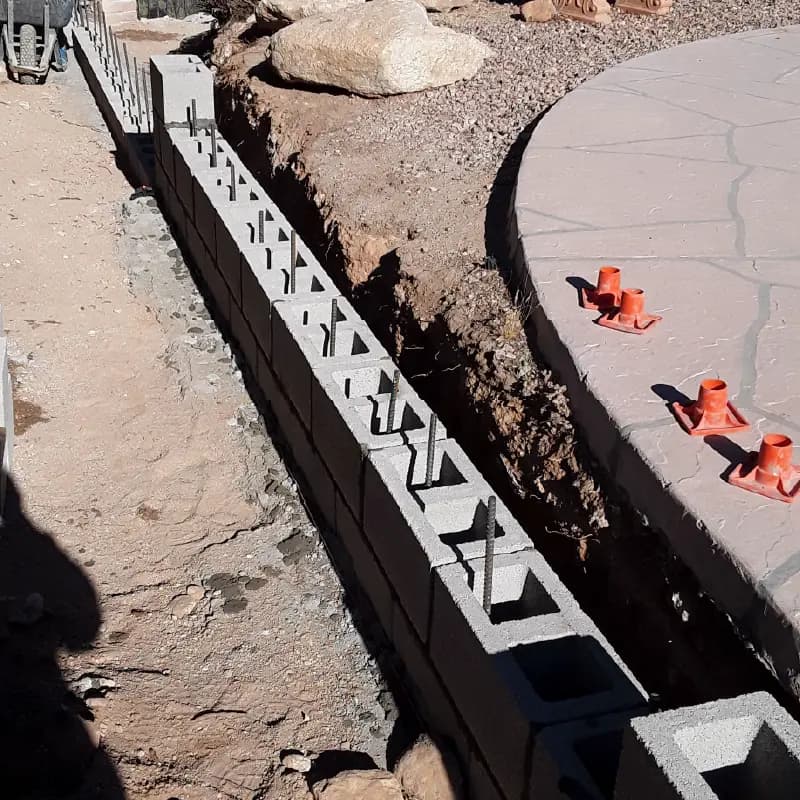 Block wall footing and foundation built by Raycrete